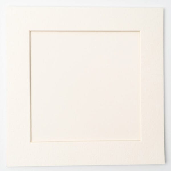 Empty square paperboard frame for displaying pressed flower artwork from DIY kits