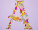 Letter A made from colorful pressed flowers in a creative DIY art style