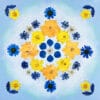 Blue and yellow mandala from a pressed flower kit, with daffodils and delphiniums on sky gradient background