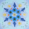 Cool-toned mandala with pressed blue daisies and yellow pansies, crafted with a pressed flower kit