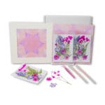 Serenity Bloom pressed flower kit featuring pink and purple dried flowers arranged in a calming floral mandala art layout.