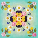 finished pressed flower mandala artwork from Serenity Light kit – bright and joyful floral composition