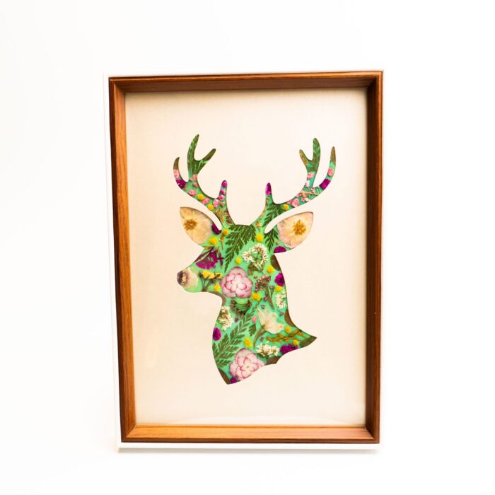Framed deer-shaped flower collage in rich green tones made with petal & still pressed flower kit.