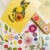 Pressed flower kit cat cosy finished design with bright yellow and orange pressed flowers.