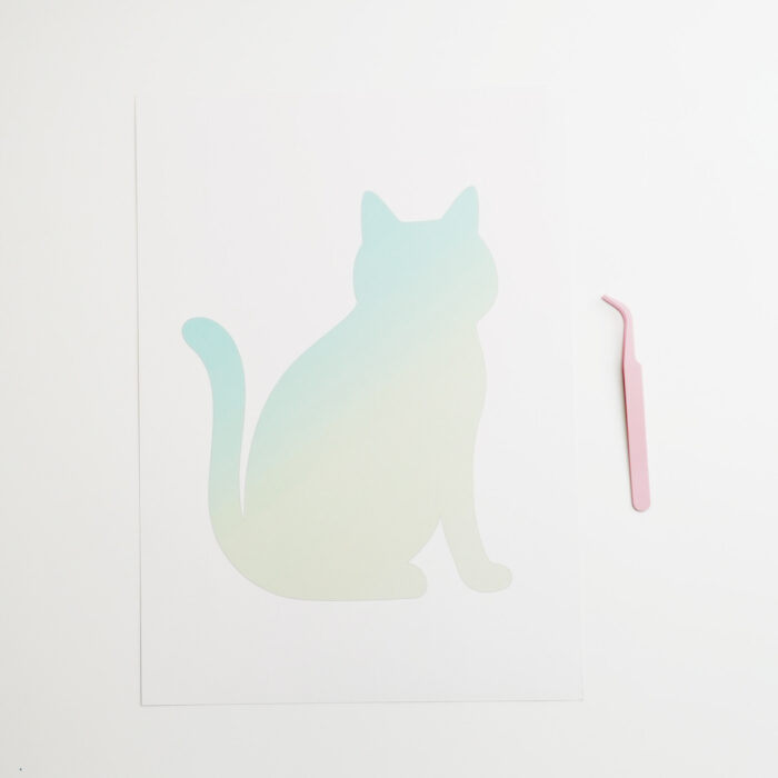 A cat template sheet for pressed flower art, providing a guide to arrange dried flowers in a feline design.