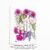 A pressed flower arrangement with purple daisies, white larkspur, and gentle pastel accents. One of the 3 floral sheets included in the Petal & Still kit.