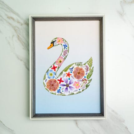Pressed flower kit swan silhouette with delicate pressed flowers on blue gradient background