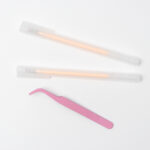 A set of tools for pressed flower art, including tweezers, glue pen, and other essentials for crafting floral designs.