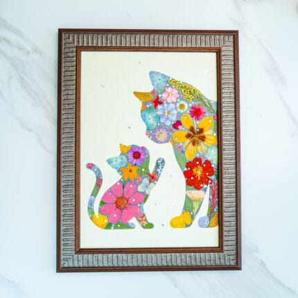 Pressed flower cat artwork of a mother cat and kitten, tender floral design symbolizing love and care