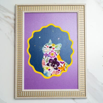 Pressed flower cat collage on purple frame, with night sky details and colorful floral arrangement.